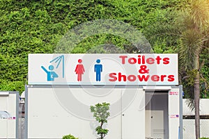 Sign of public toilets and shower for women and men. Public toilets and shower