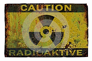 SIGN RADIATION, an old rusty sign reading: caution radioactive