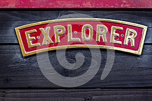 Sign reading Explorer in metal