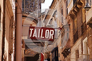 Sign reading Tailor in Valletta, capital city of Malta