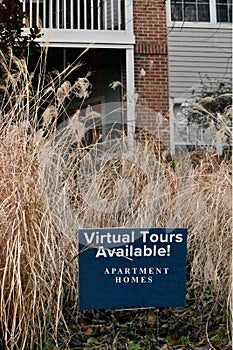 Sign reads Virtual Tours Available for Apartment Complex