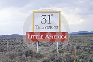 A sign that reads Ã¯Â¿Â½31Ã¯Â¿Â½ Televisions - Little AmericaÃ¯Â¿Â½ photo