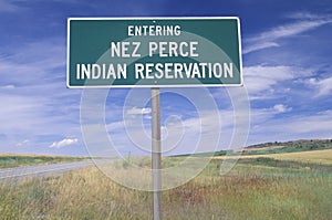 A sign that reads Ã¯Â¿Â½Entering Nez Perce Indian ReservationÃ¯Â¿Â½ photo