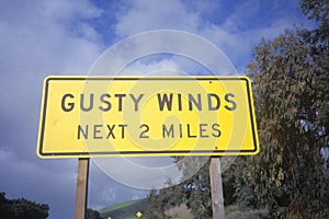 A sign that reads ï¿½Gusty windsï¿½