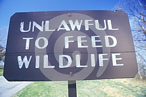 A sign that reads ï¿½Unlawful to feed wildlifeï¿½