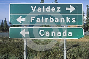 A sign that reads ï¿½Valdez/Fairbanks/Canadaï¿½