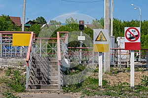 Sign red stop signal for pedestrians at traffic lights and warning signs