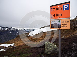 Sign for the rescue cabin on the mountain way to the Trolltunga, Norway