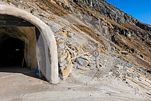 Sign restricting walking outside of the tunnel due to difficult terrain