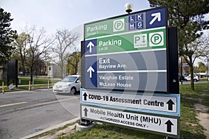 Sign on the road for direction to Sunnybrook`s Mobile Health Unit MHU