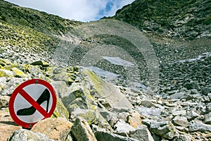 Sign on the rocky mountain slope. High Tatra Mountains, Slovakia.