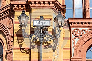 sign Rohrpost at Post office building on Oranienburger street in Berlin