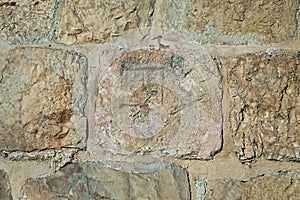 Sign of the Roman Legion of the time of Jesus Christ, carved on a stone embedded in the walls of the Old City of Jerusalem