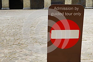 Sign saying admission by guided tour only