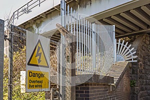 Sign saying Danger Overhead live wires