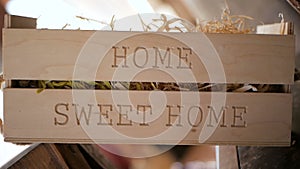 Sign saying `Home Sweet Home` at market stand or restaurant