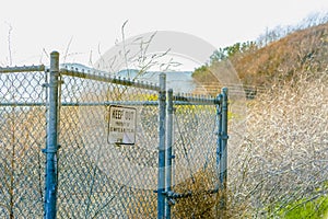 Sign saying Keep Out on fence