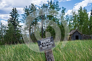 Sign says Posted No Trespassing Keep Out