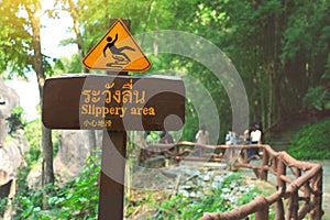 Sign showing a slippery area.