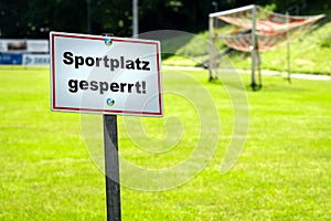 Sign shows cloesed sporting ground