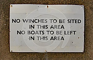 Sign at the slipway on Sidmouth sea front telling boat owners to keep the way clear