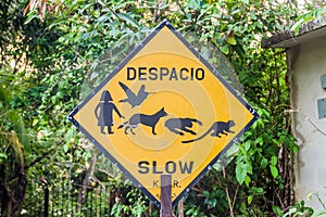 Sign slow in Manuel Antonio village, Costa Ri