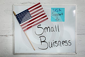 Sign of small business support with a United States of America flag