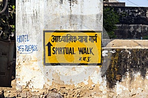 Sign spiritual walk at the wall