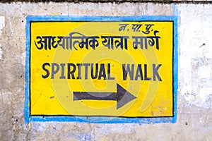 Sign spiritual walk at the wall