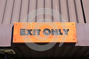 Sign stating EXIT ONLY photo