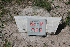 Sign stating KEEP OFF photo