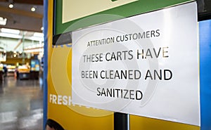 Sign at store stating Carts Have Been Cleaned And Sanitized