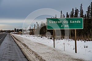Sign for Suncor  oil sands North  of Fort McMurray  on highway  63Alberta