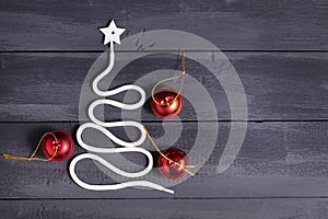 Sign symbol Christmas tree on a wooden background. A copy of space. The idea of a merry new year. Christmas.