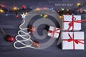 Sign symbol Christmas tree on a wooden background. A copy of space. The idea of a merry new year. Christmas.