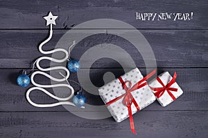 Sign symbol Christmas tree on a wooden background. A copy of space. The idea of a merry new year. Christmas.