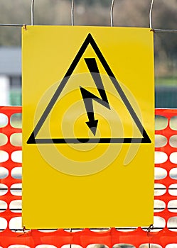 Sign with the symbol of a lightning bolt for electrocution Dange photo