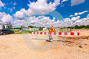 Sign with symbol of warning at construction zone area