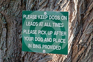 Sign telling you to keep dogs on lead and pick up there waste.