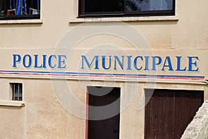 Sign text facade of police municipale means in french Municipal Police in France under authority city Mayor photo