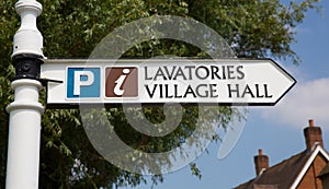 Sign to lavatories and village hall