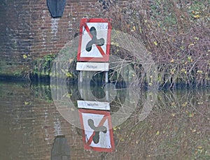 Sign to warn that boats with a motor are not allowed in the mallegat in the Netherlands