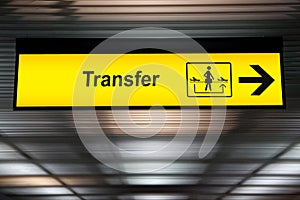 Sign transfer with arrow for direction for transit passenger