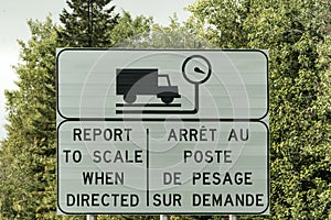 Sign Trucking Weigh Station scale report weight on highway in Quebec Canada