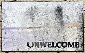 Weathered UNWELCOME Mat