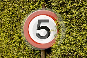 Sign on vacation park to limit speed to five kilomet