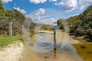 Sign vulnerable nature reserve, no entry, on island Neeltje Jans near Oosterscheldekering, Zeeland, Netherlands