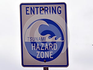 A sign warning that this area is a tsunami hazard zone