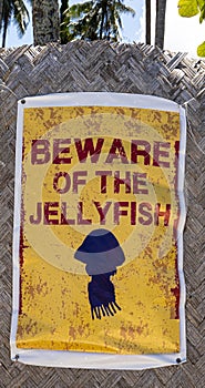 Sign warning of poisonous jellyfish on a beach near El Nido