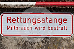 Sign, warning sign on wall, Germany, German, rescue pole